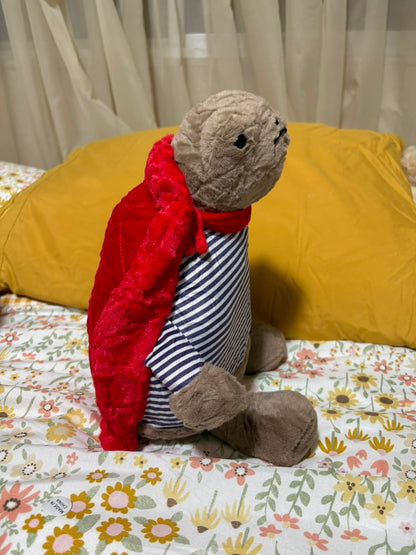 Grumpy Superhero Turtle Plush Toy – Striped Shirt & Red Cape
 - 30 cm